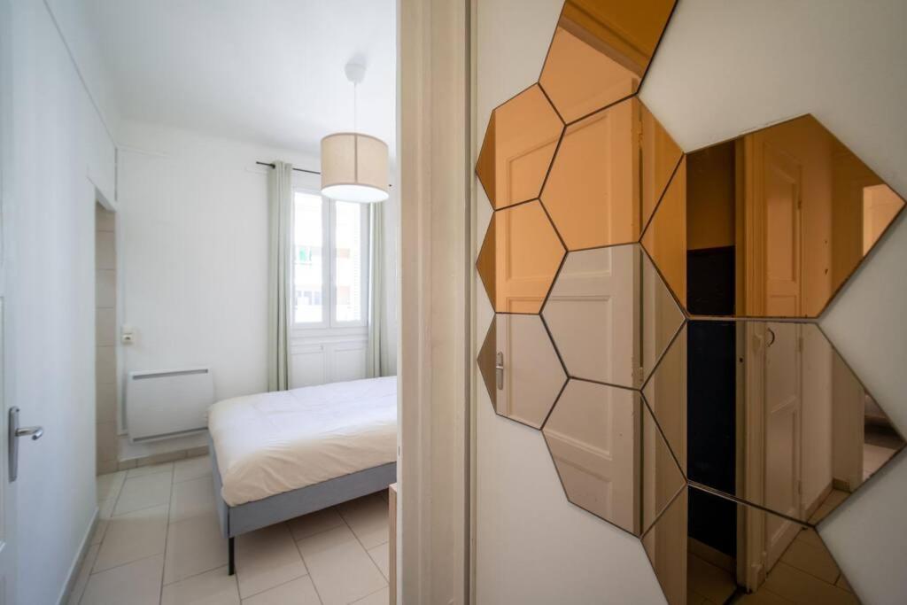 Posteľ alebo postele v izbe v ubytovaní Appartement tout équipé balcon 4 pers St Charles