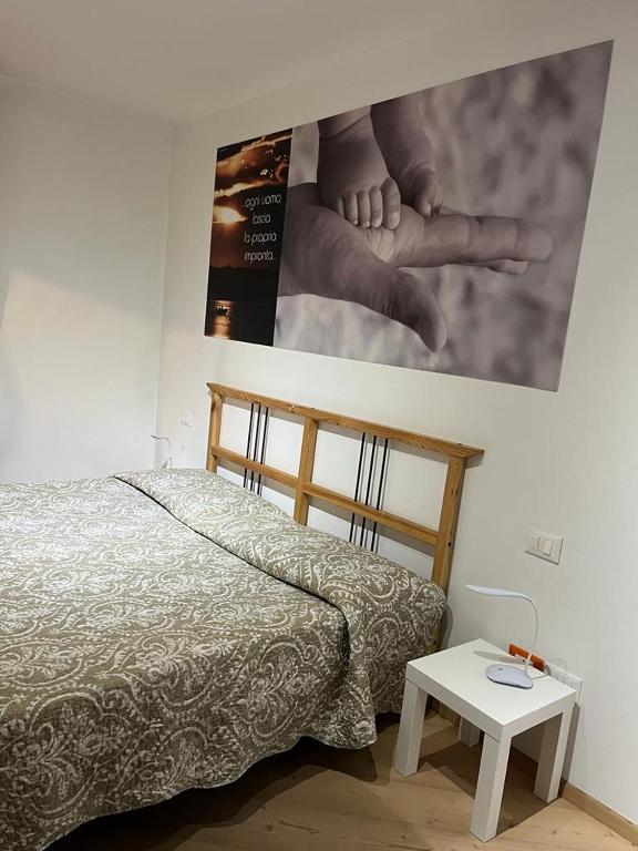 A bed or beds in a room at CA' del GIACOMINO