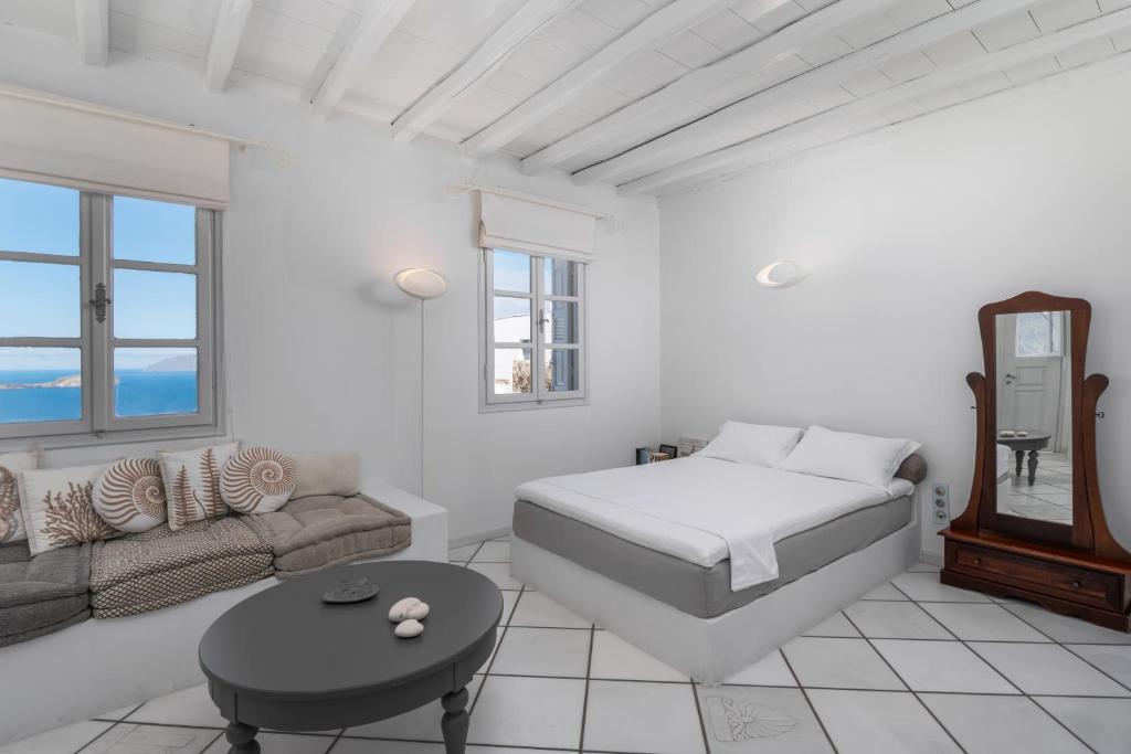 A bed or beds in a room at Archondoula Studios