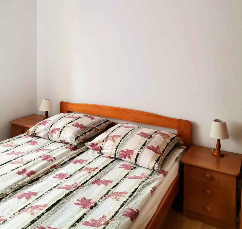 Postel nebo postele na pokoji v ubytování Villa Joanna