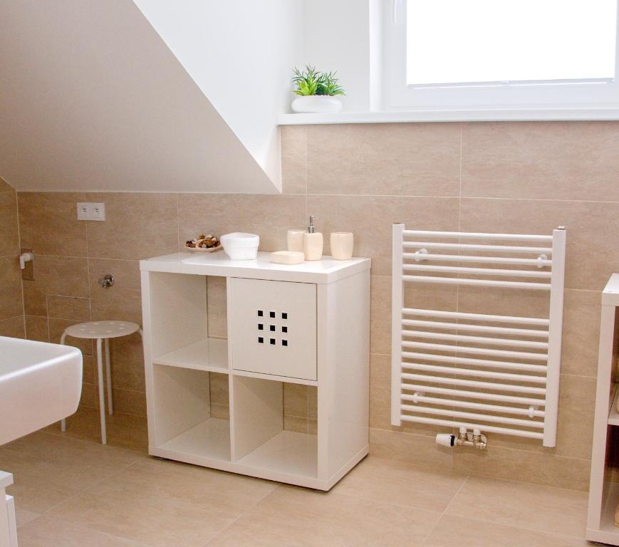 Koupelna v ubytování Apartmánový dům Sklípek