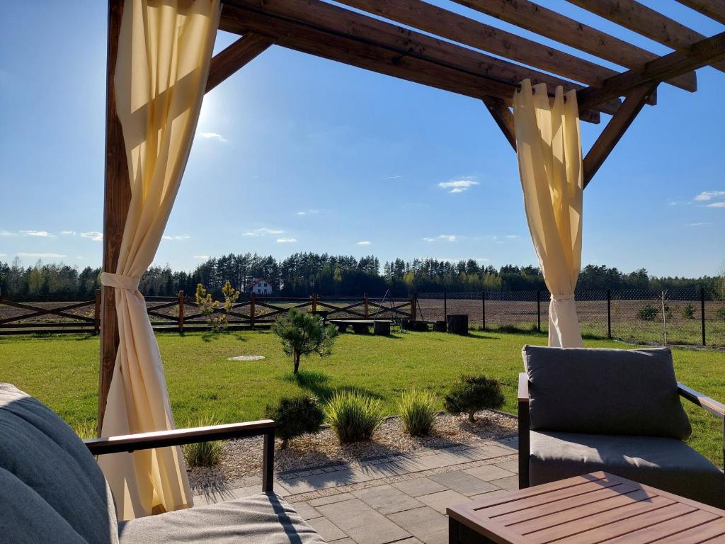 Vonkajšia záhrada v ubytovaní Domek nad Marychą - Zelwa