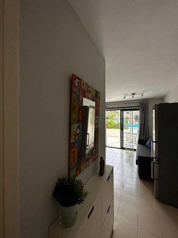 TV a/nebo společenská místnost v ubytování Los Cancajos Apartamento Acijoa
