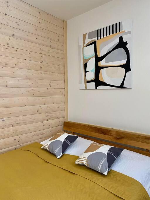 Postel nebo postele na pokoji v ubytování Chata North Point Zuberec pod Roháčmi