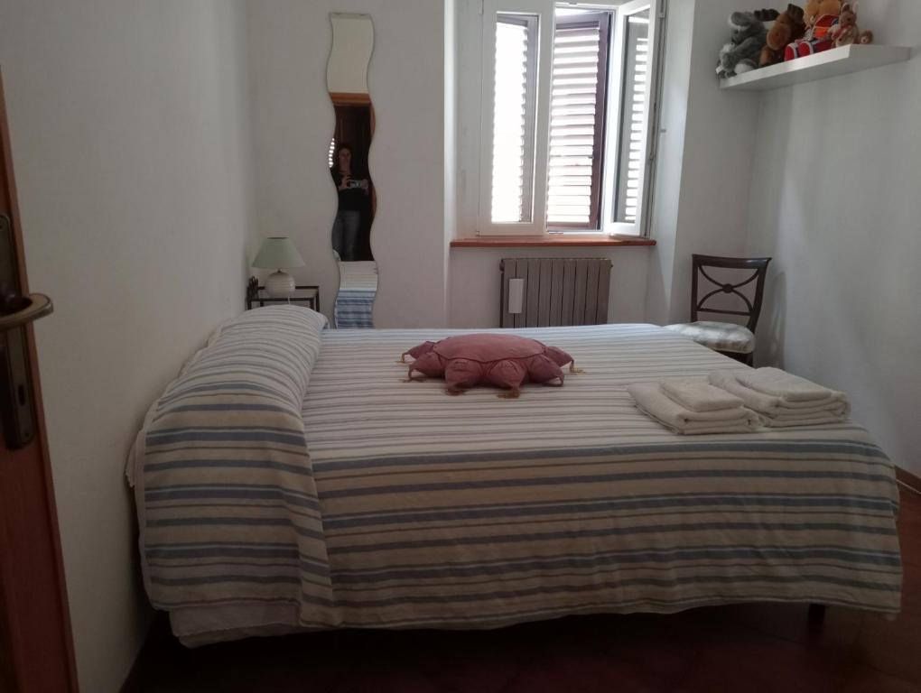 Posteľ alebo postele v izbe v ubytovaní Casa Azzurra