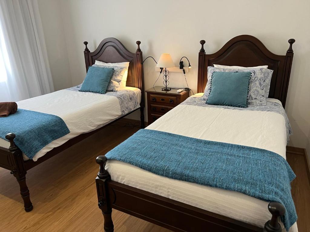 Postel nebo postele na pokoji v ubytování Palácio - Exclusive Villa, Caloura