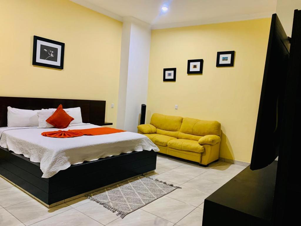 Postel nebo postele na pokoji v ubytování Hotel Boutique Rosa de Lima