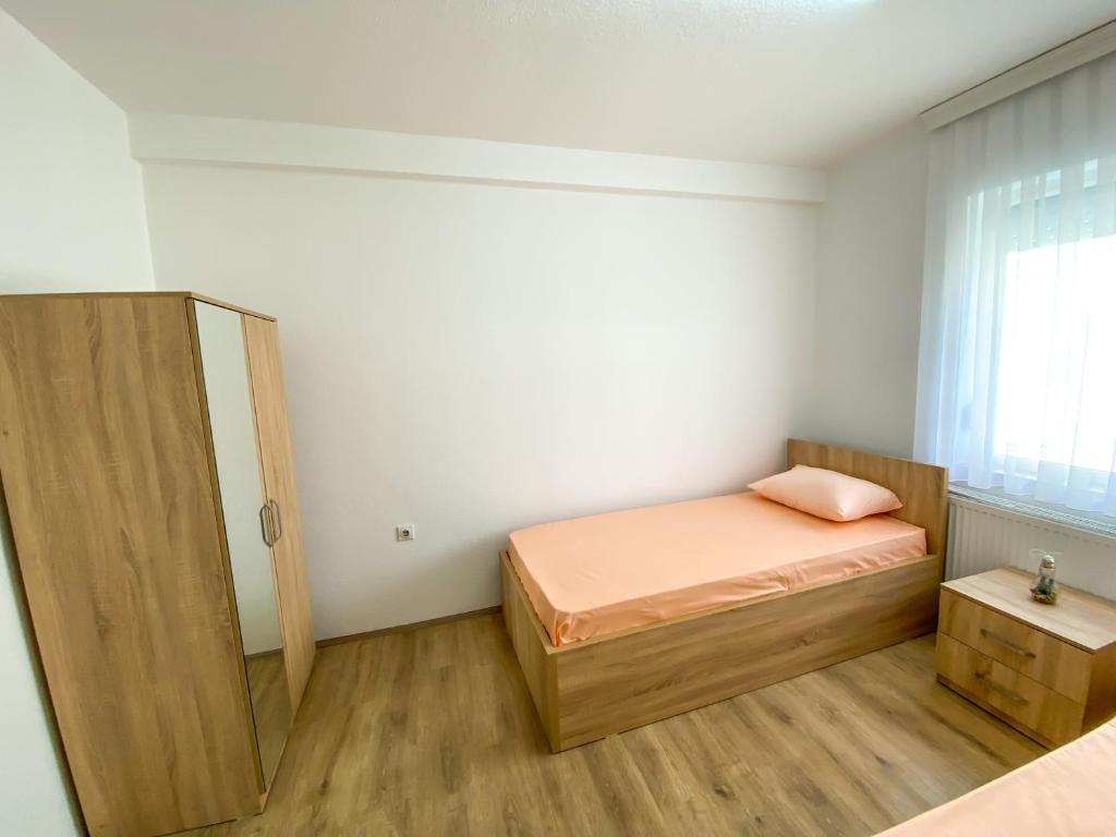 Postel nebo postele na pokoji v ubytování Rooms LikeHome
