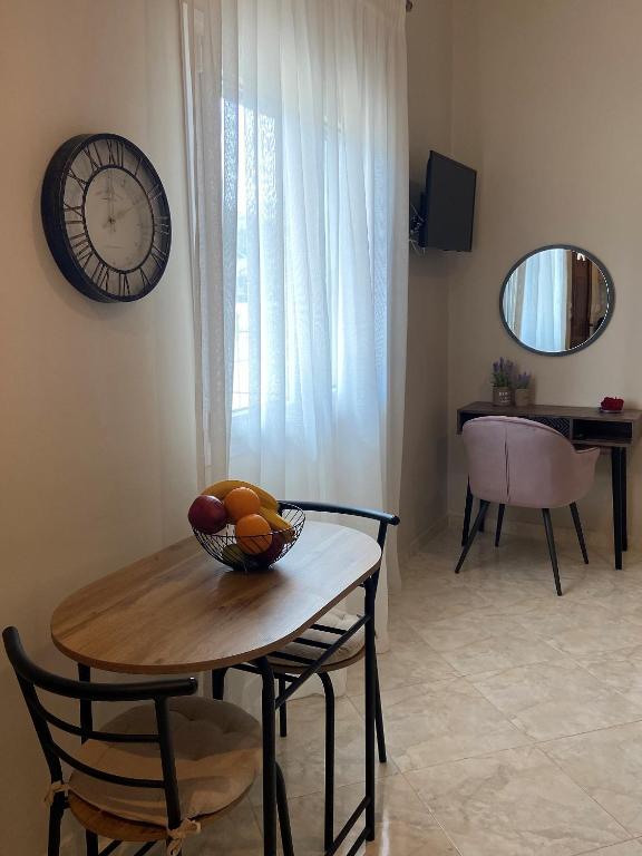 TV a/nebo společenská místnost v ubytování Casa di Elena