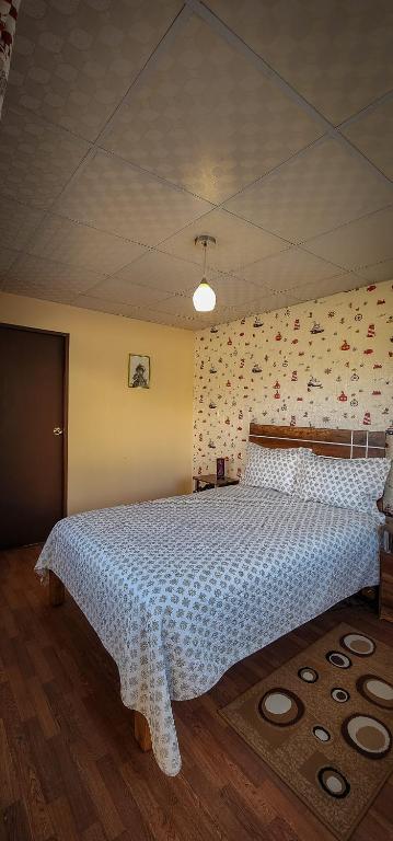 Postel nebo postele na pokoji v ubytování Casa huerta Stuber