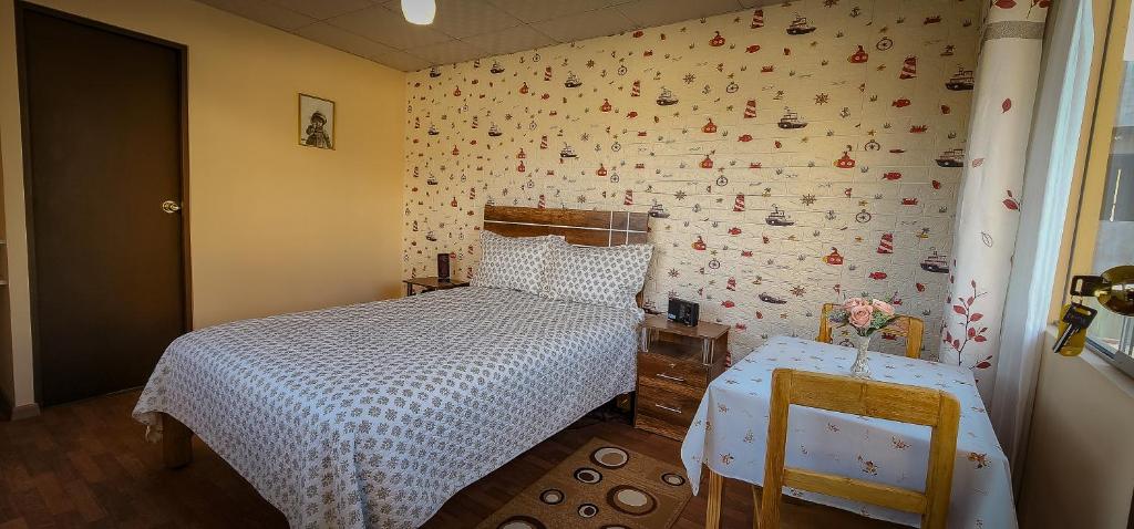 Postel nebo postele na pokoji v ubytování Casa huerta Stuber