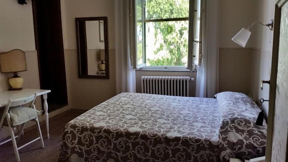 Postel nebo postele na pokoji v ubytování Hotel Stipino