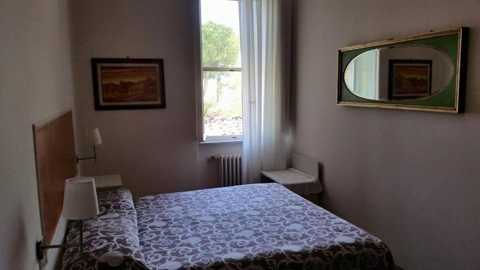 Postel nebo postele na pokoji v ubytování Hotel Stipino
