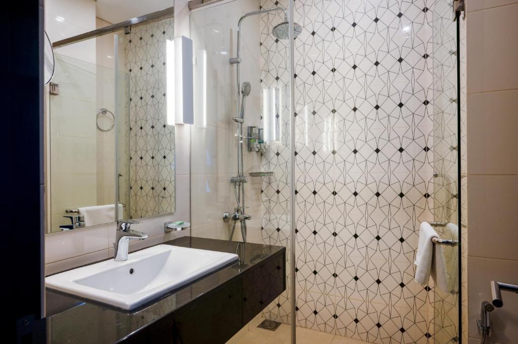 Koupelna v ubytování Orion City Hotel