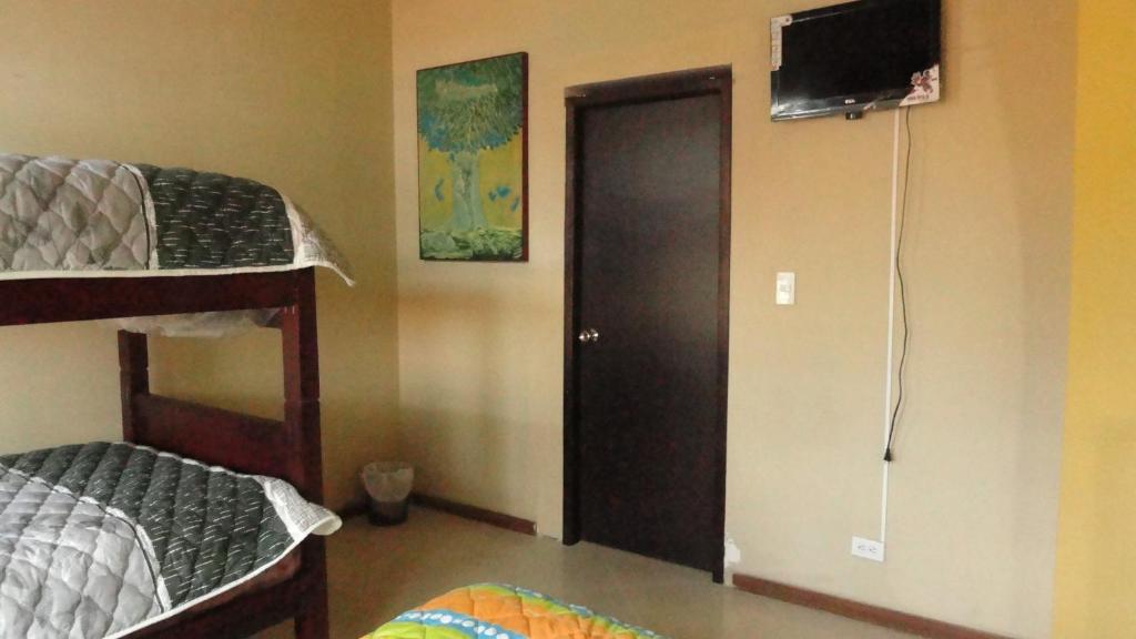 Postel nebo postele na pokoji v ubytování Hostel Del Piamonte 2