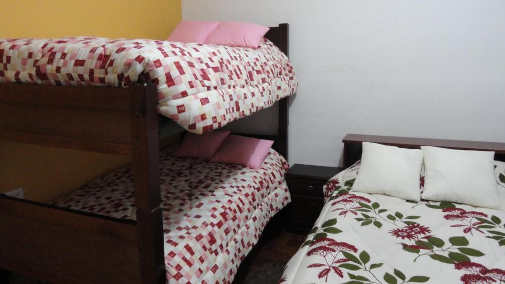 Postel nebo postele na pokoji v ubytování Hostel Del Piamonte 2