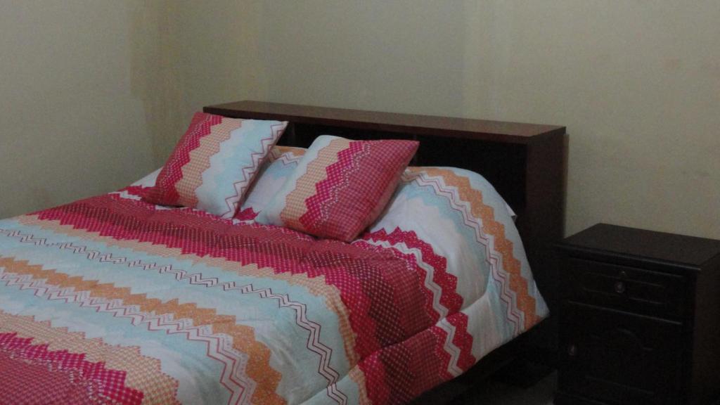Postel nebo postele na pokoji v ubytování Hostel Del Piamonte 2