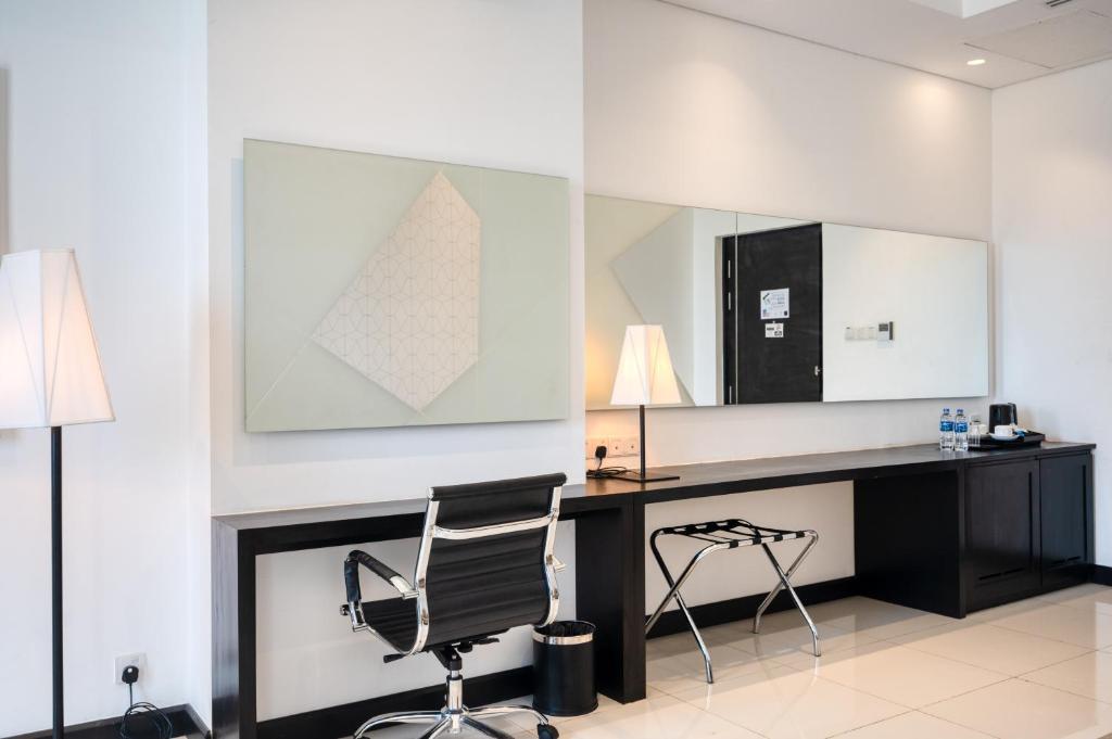 Kuchyň nebo kuchyňský kout v ubytování Orion City Hotel