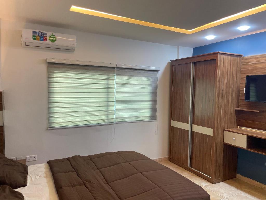 Postel nebo postele na pokoji v ubytování Al Deyafa Hotel