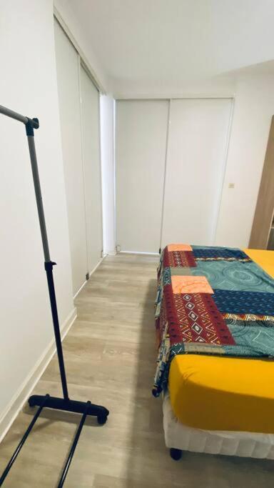 Postel nebo postele na pokoji v ubytování Marin’Appart * vue sur mer*