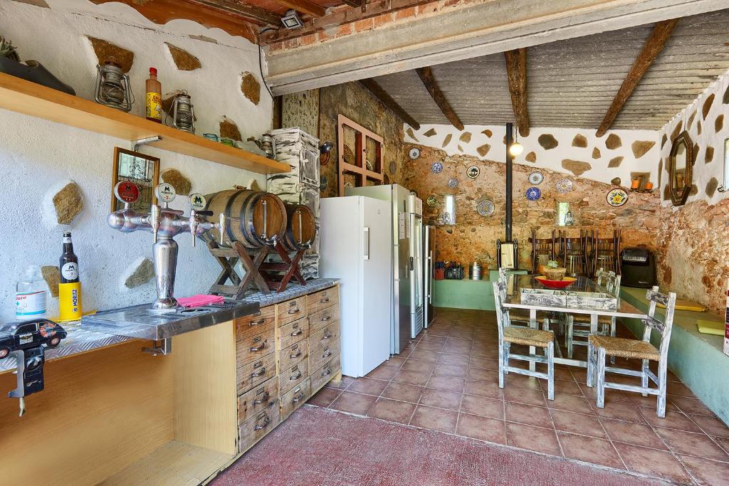 Kuchyň nebo kuchyňský kout v ubytování B&B Mas Torrencito Pet Friendly