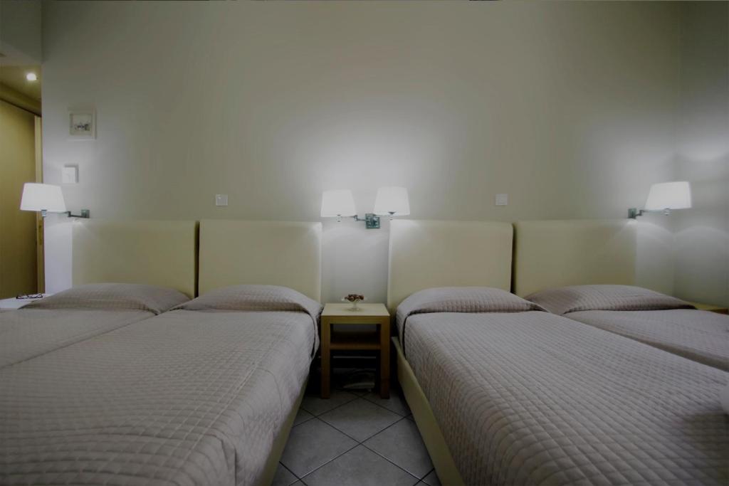 Diogenis Hotelにあるベッド