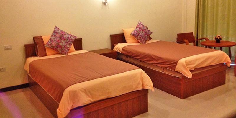 Postel nebo postele na pokoji v ubytování Baan Suan Villas Resort