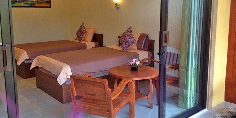 Postel nebo postele na pokoji v ubytování Baan Suan Villas Resort