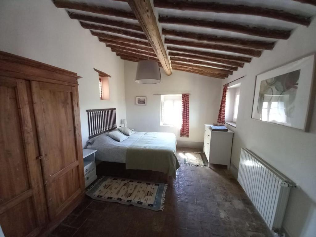Postel nebo postele na pokoji v ubytování Agriturismo Timignano