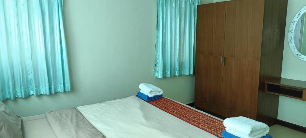 Postel nebo postele na pokoji v ubytování Baan Suan Villas Resort