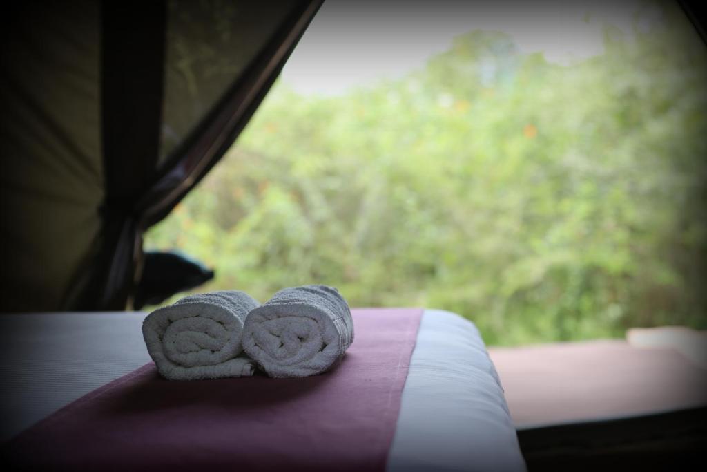 Postel nebo postele na pokoji v ubytování Basecamp - Yala