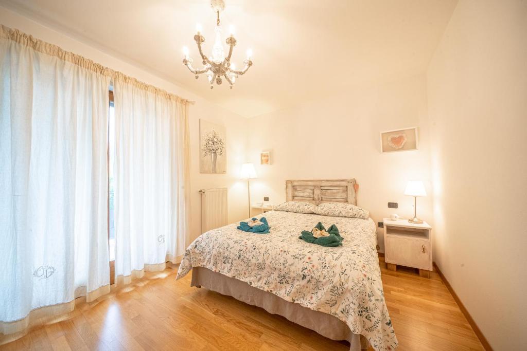 Ліжко або ліжка в номері Dolce Casa Riva