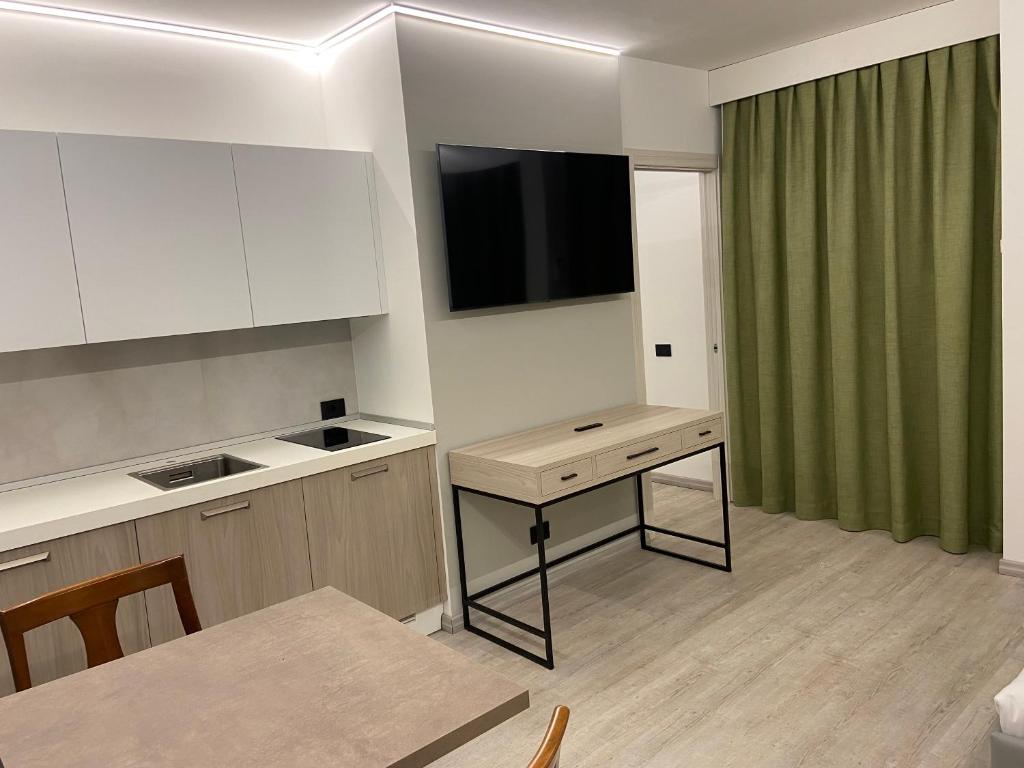 Kuchyň nebo kuchyňský kout v ubytování Corte Ongaro Hotel