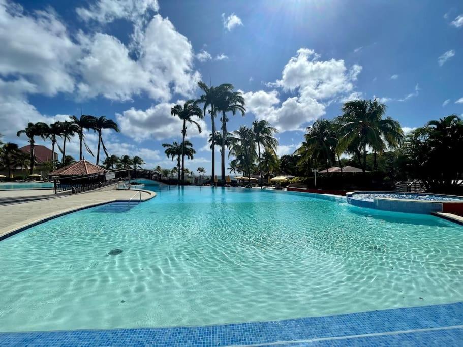 Bazén v ubytování Appart avec piscine et vue mer - TAC nebo v jeho okolí