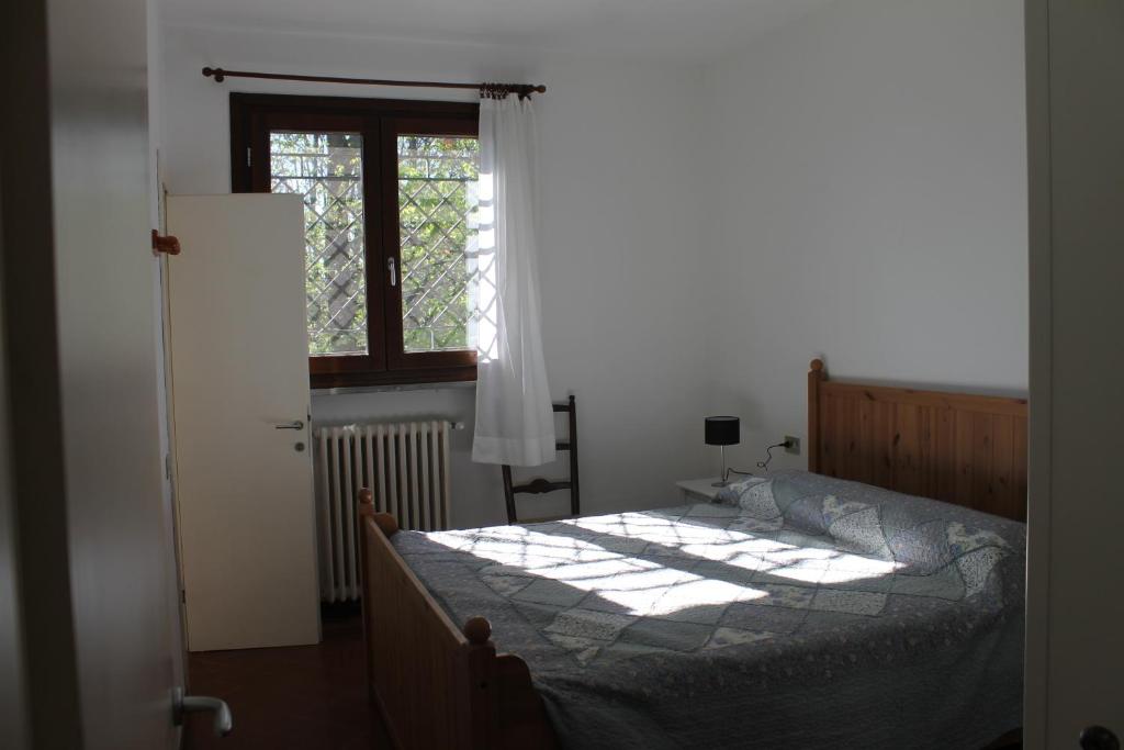 Postel nebo postele na pokoji v ubytování Casa Vacanze Tana della Volpe