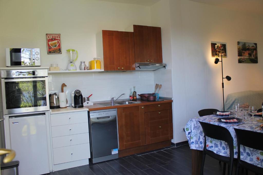 Kuchyň nebo kuchyňský kout v ubytování Casa Vacanze Tana della Volpe