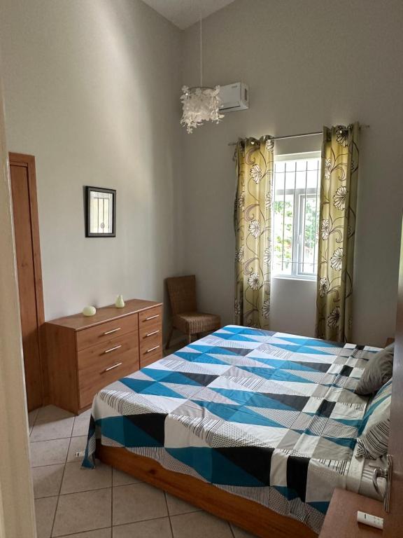 Postel nebo postele na pokoji v ubytování Sacha Tourist Residence 1