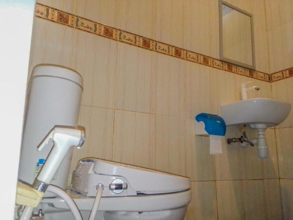 Koupelna v ubytování G-Rima Home Stay