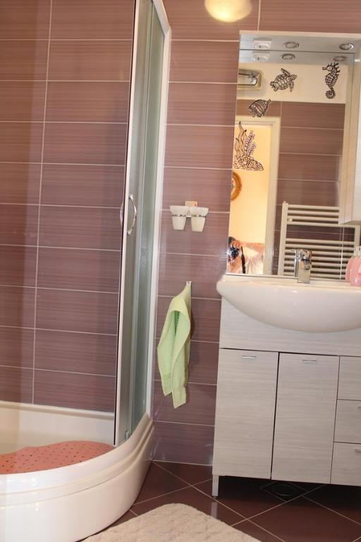 Koupelna v ubytování Rooms Katarina