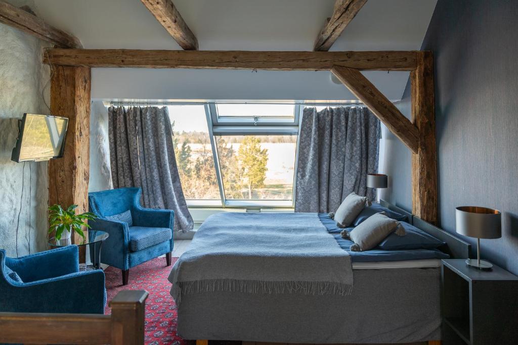 Postel nebo postele na pokoji v ubytování Dagen Haus Guesthouse