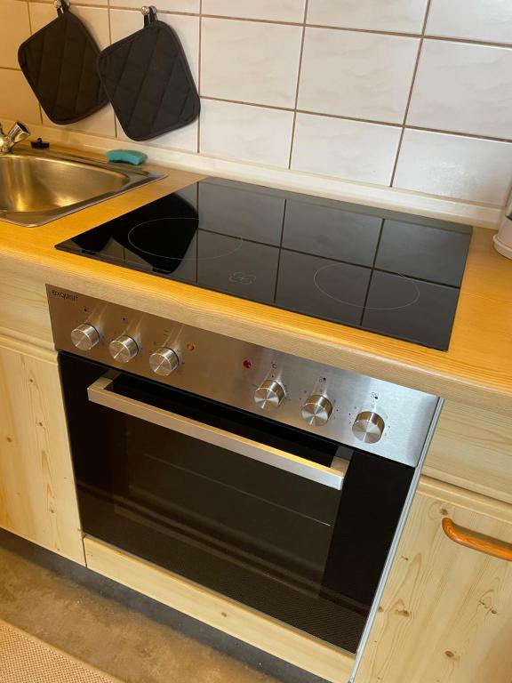 Kuchyň nebo kuchyňský kout v ubytování Feriendorf Hauzenberg