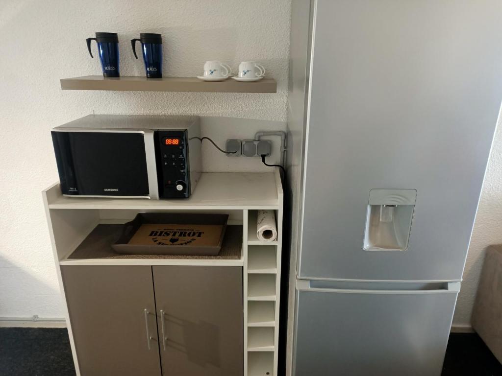 Kuchyň nebo kuchyňský kout v ubytování Studio Vue Mer 100 m de la plage