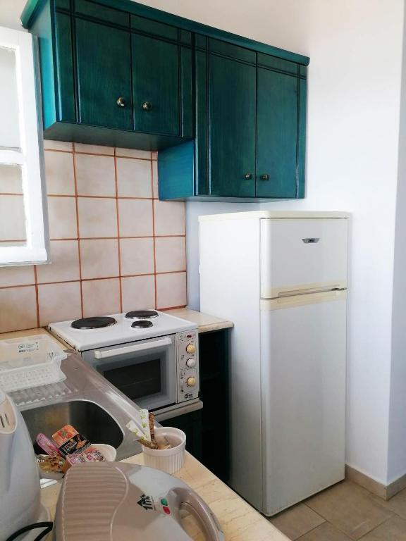 Kuchyň nebo kuchyňský kout v ubytování Aigaio View Studios & Rooms