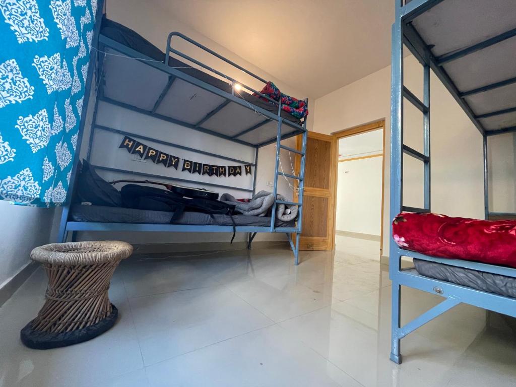 Postel nebo postele na pokoji v ubytování Bir Nest Hostel