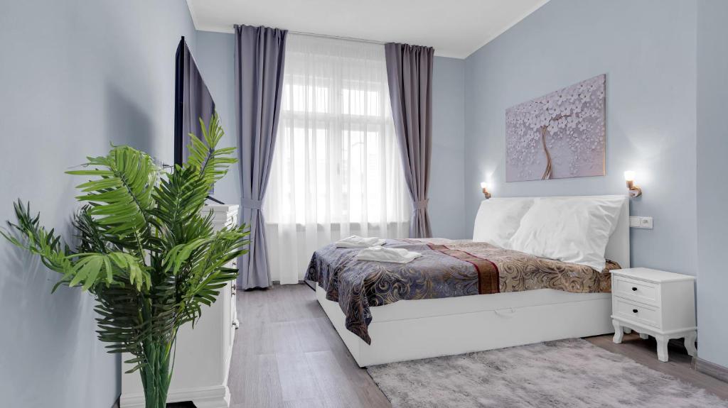 Postelja oz. postelje v sobi nastanitve Aphrodite Suite Hotel Karlovy Vary