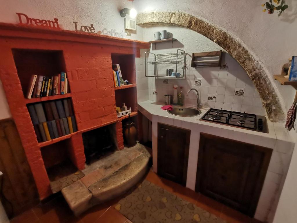 Kuchyň nebo kuchyňský kout v ubytování Casa MAMMUCCIA