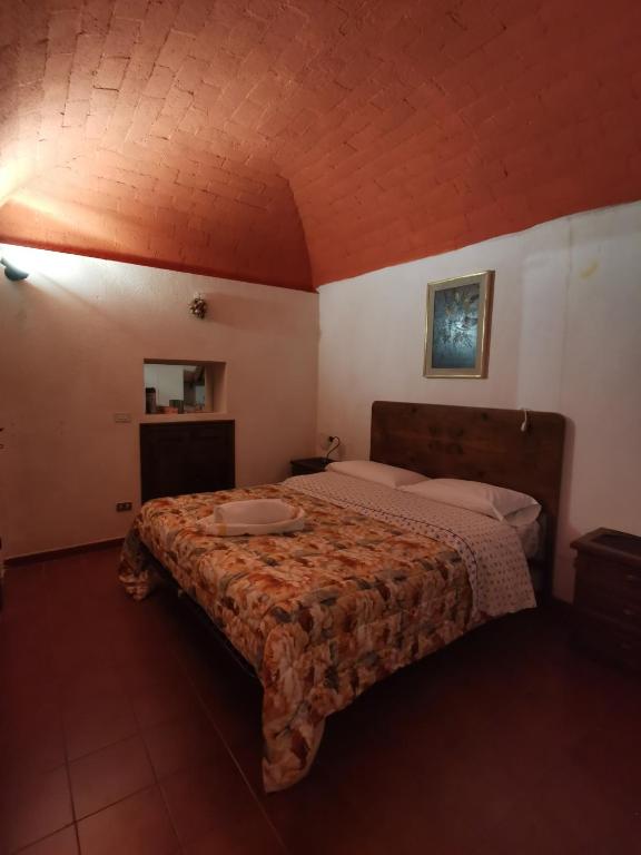 Postel nebo postele na pokoji v ubytování Casa MAMMUCCIA