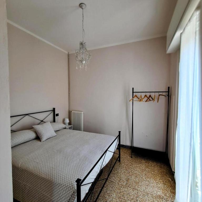 Postel nebo postele na pokoji v ubytování Borgomare Camere e Colazioni
