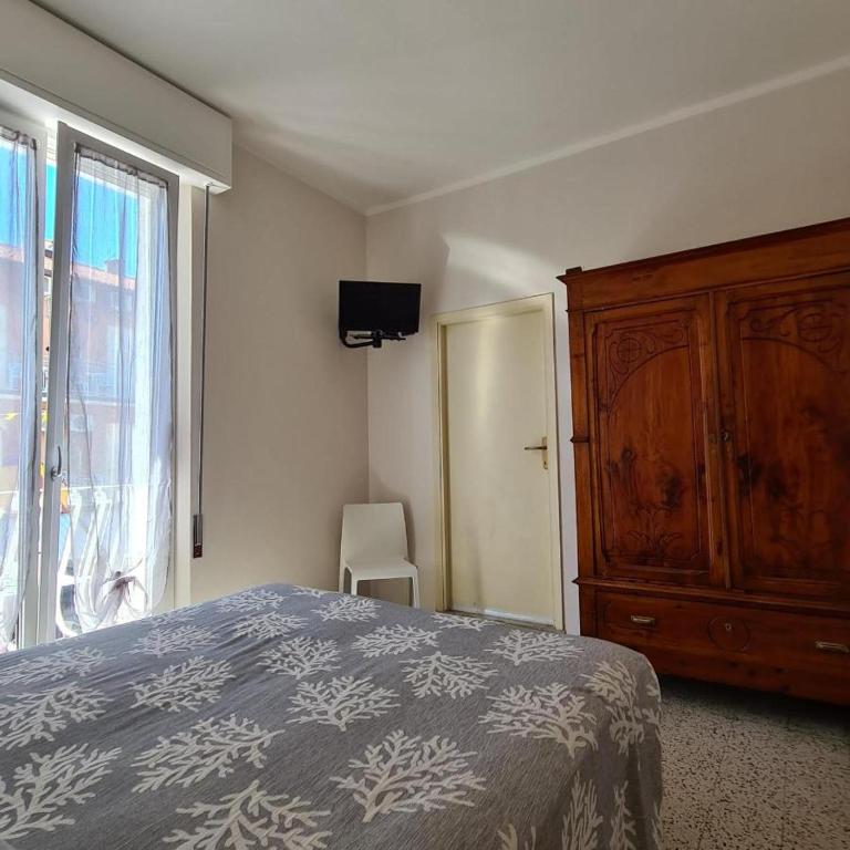 Postel nebo postele na pokoji v ubytování Borgomare Camere e Colazioni