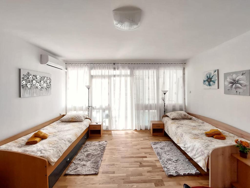 Postel nebo postele na pokoji v ubytování Apartment Oliva